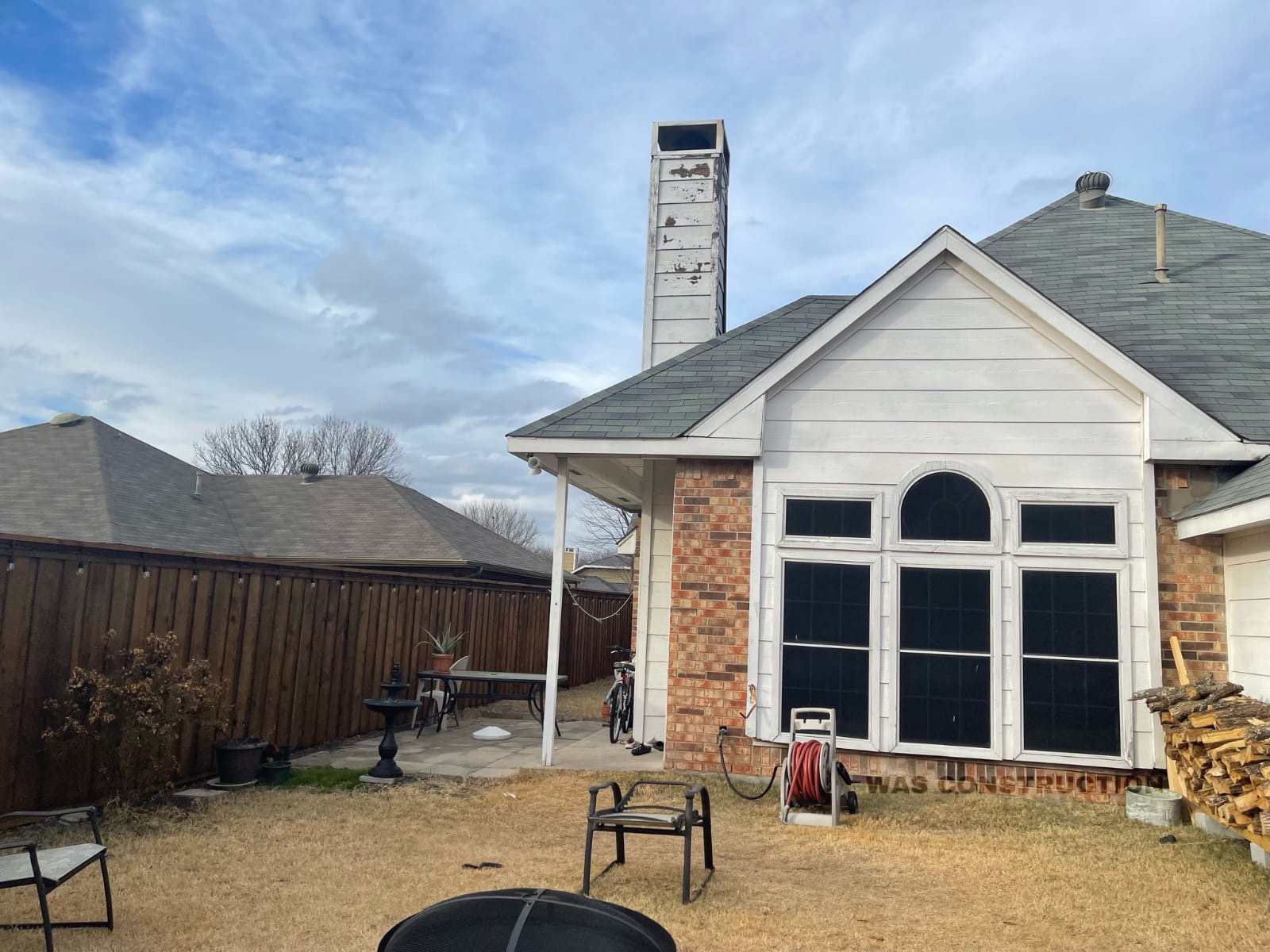 Before: 7418 project — rear of home before restoration