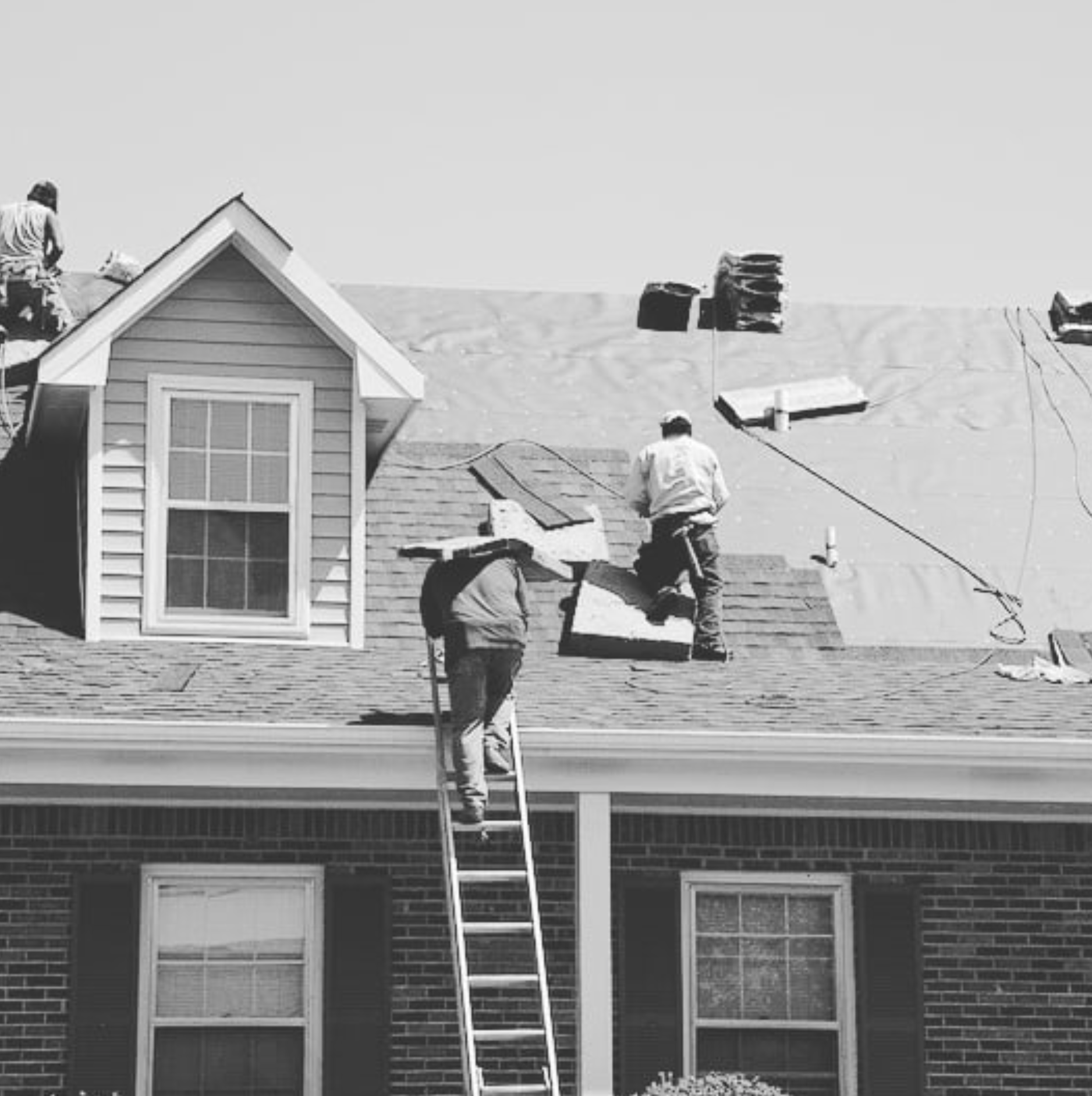 WAS Construction crew working on a roof replacement — Irving TX