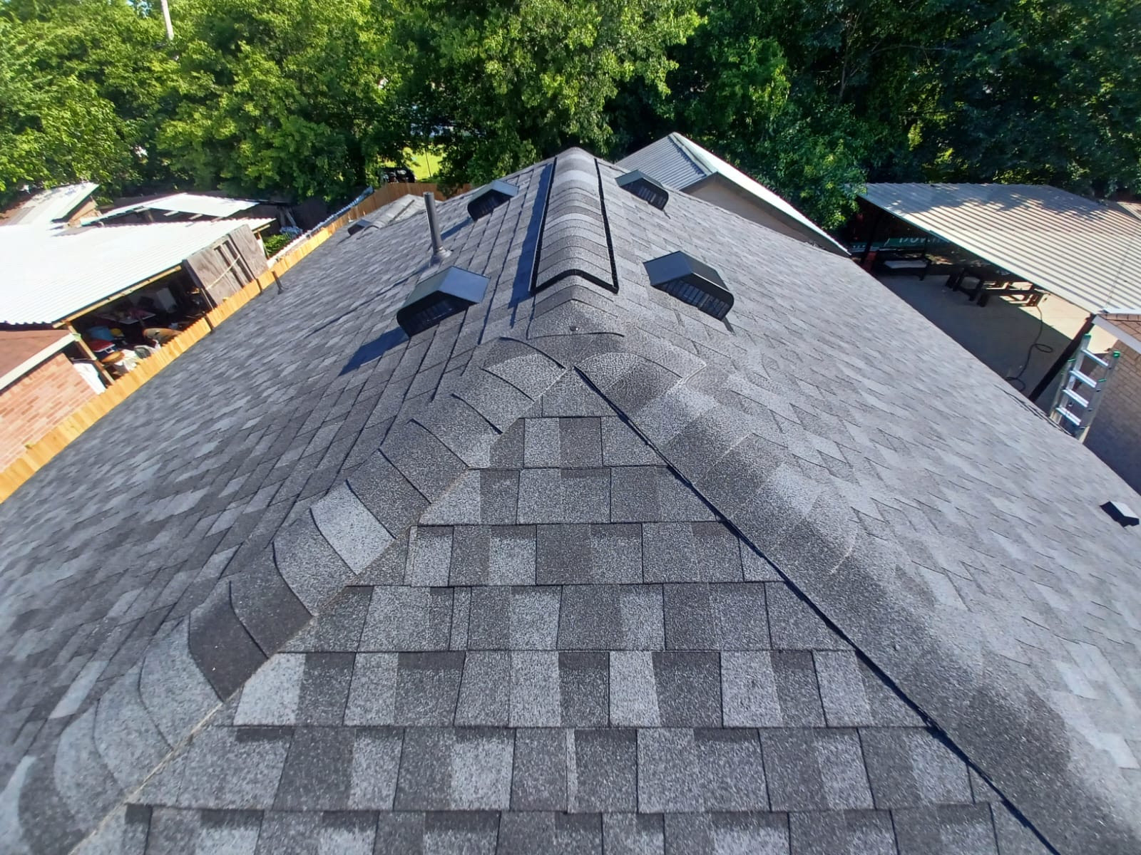 Completed charcoal roof with new ridge vents